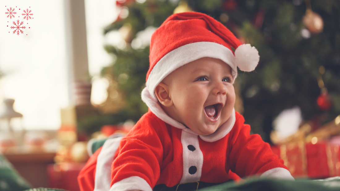 baby and parents on christmas morning