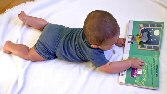 Baby reading music book