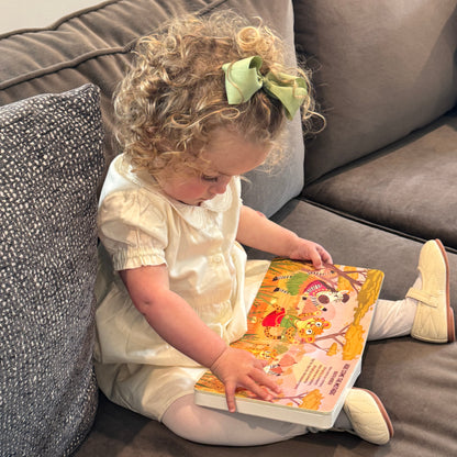 Toddler reading I DIscover World Music Book